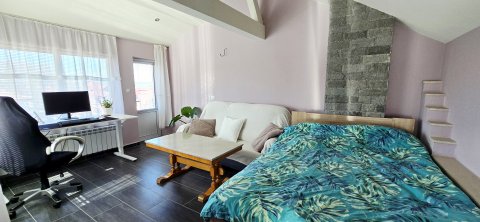 For sale a two-storey house with 3 bedrooms, a tavern and a garage near the center of Aytos