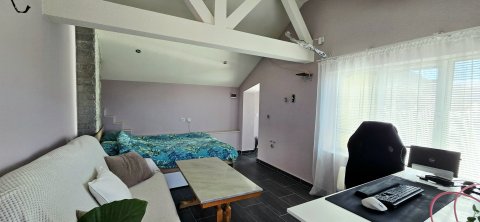 For sale a two-storey house with 3 bedrooms, a tavern and a garage near the center of Aytos