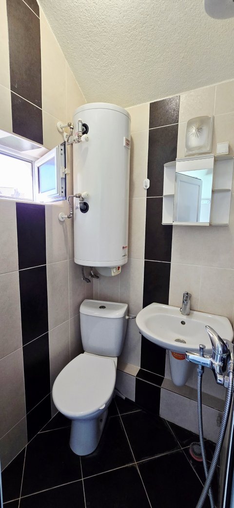 For sale a two-storey house with 3 bedrooms, a tavern and a garage near the center of Aytos