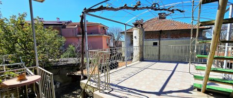 For sale a two-storey house with 3 bedrooms, a tavern and a garage near the center of Aytos