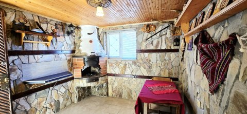 For sale a two-storey house with 3 bedrooms, a tavern and a garage near the center of Aytos