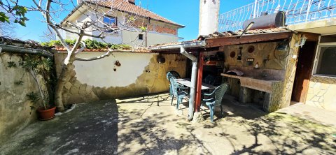 For sale a two-storey house with 3 bedrooms, a tavern and a garage near the center of Aytos