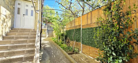 For sale a two-storey house with 3 bedrooms, a tavern and a garage near the center of Aytos